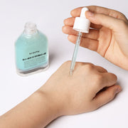 ProtoClinical k-beauty beige and mauve beauty product packaging on a light background.