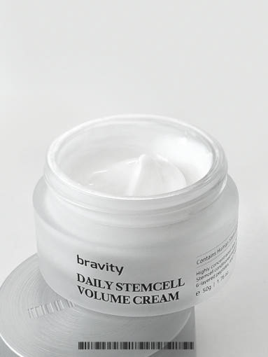 ProtoClinical k-beauty portrait beauty product packaging on a light background.
