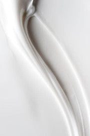 ProtoClinical k-beauty portrait beauty product packaging on a light background.