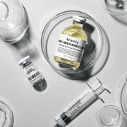 ProtoClinical k-beauty dark gray vertical beauty product on a light background.
