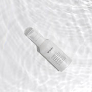 ProtoClinical k-beauty pale blue and cream beauty product packaging on a light background.
