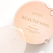 ProtoClinical k-beauty PETITFEE Beautifying Pore Pad 84g/30ea single round beige pad container centered on a light background