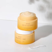 ProtoClinical k-beauty PETITFEE Beautifying Glow On Hydrator 50ml single upright warm peach hydrator package centered on a pale background with light blue side accents