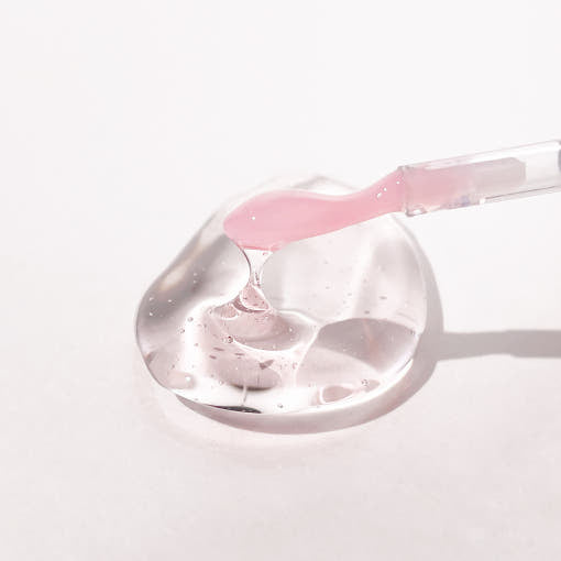 ProtoClinical k-beauty PETITFEE Super Volume Lip Oil 3g two taupe lip oil bottles side by side on a white background with pale peach side shading