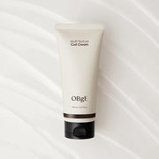 ProtoClinical k-beauty OBgE Multi Texture Curl Cream 150ml single upright light beige bottle centered on a pale background.