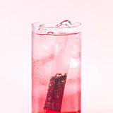 ProtoClinical k-beauty pink beauty product silhouette with a deep rose center on a light background.