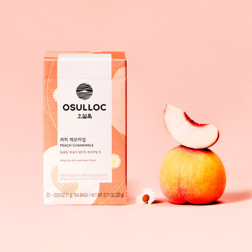 ProtoClinical k-beauty peach beauty product detail on a warm light background.