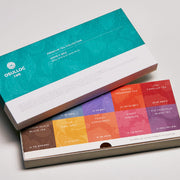 ProtoClinical k-beauty soft aqua beauty detail with a muted olive center and coral lower-right tones on a light background.