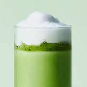 ProtoClinical k-beauty pale blue and green beauty detail with a dark olive center on a light background.