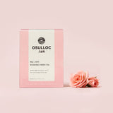 ProtoClinical k-beauty soft pink beauty product detail on a pale mauve background.