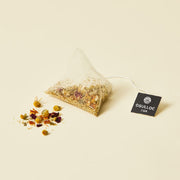 ProtoClinical k-beauty pale yellow beauty detail with a muted olive horizontal band on a light background.