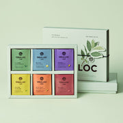 ProtoClinical k-beauty light olive skincare product packaging on a light background.