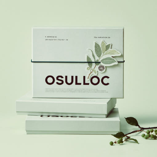 ProtoClinical k-beauty pale green skincare product packaging on a light background.