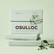 ProtoClinical k-beauty pale green skincare product packaging on a light background.
