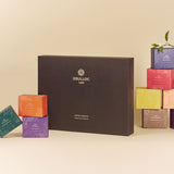 ProtoClinical k-beauty product packaging in warm beige tones on a light background.