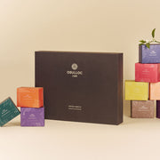 ProtoClinical k-beauty product packaging in warm beige tones on a light background.