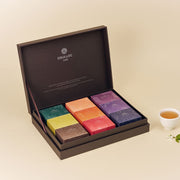 ProtoClinical k-beauty product packaging in warm beige tones on a light background.