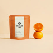 ProtoClinical k-beauty soft peach beauty product detail on a pale background.