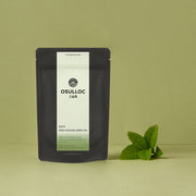 ProtoClinical k-beauty olive green beauty graphic with a faint grid pattern on a light background.