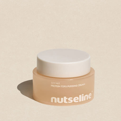 ProtoClinical k-beauty warm beige beauty packaging on a light background.