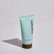 ProtoClinical k-beauty pastel beauty graphic with pink, mint, and violet color fields on a light background.