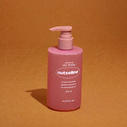 ProtoClinical k-beauty rosy pink beauty silhouette on a warm brown background.