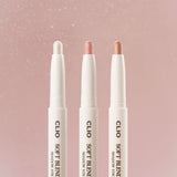ProtoClinical k-beauty CLIO Soft Blending Shadow Stick 1.4g (9colors) three white shadow stick tips arranged side by side on a pink background with shimmer shades visible