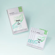 ProtoClinical k-beauty MEDIHEAL Derma Synergy Wrapping Mask Calming Care (Tea Tree X Cica) 25ml X 14ea single pale green face mask pouch centered upright on a mint background