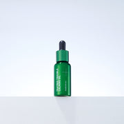 ProtoClinical k-beauty MEDIHEAL Teatree Trouble Calming Oil 10ml single upright green oil bottle centered on a pale lavender background