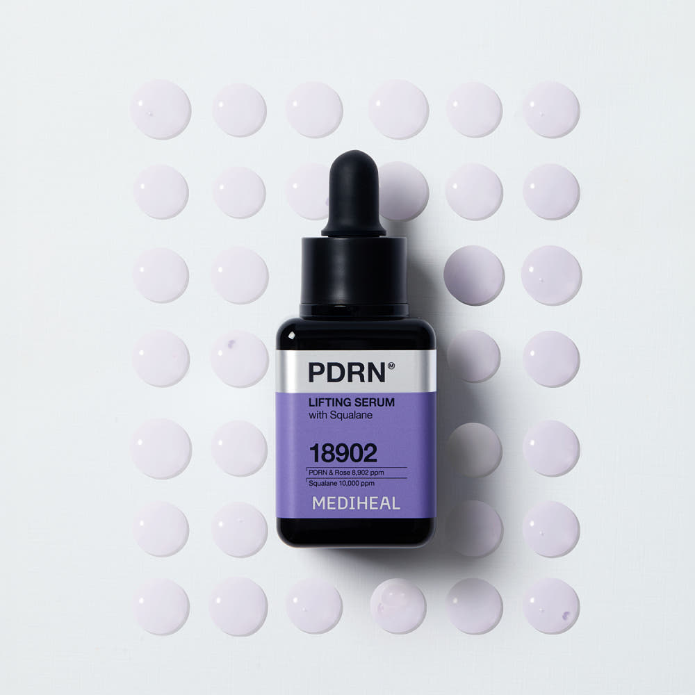 ProtoClinical k-beauty MEDIHEAL PDRN Lifting Serum with Squalane 40ml single upright gray serum bottle centered on a pale background with soft yellow side accents