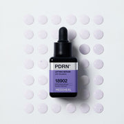 ProtoClinical k-beauty MEDIHEAL PDRN Lifting Serum with Squalane 40ml single upright gray serum bottle centered on a pale background with soft yellow side accents