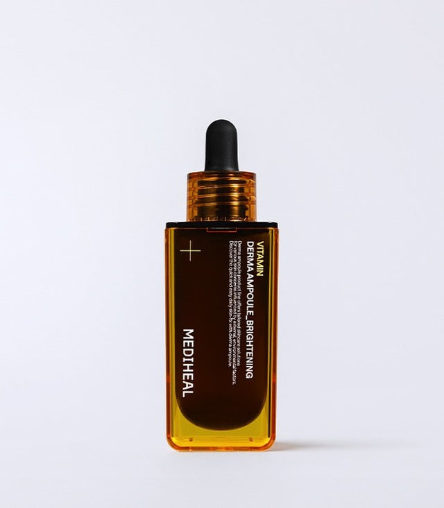 ProtoClinical k-beauty MEDIHEAL Vitamin Derma Ampoule Brightening 50ml single upright brown ampoule bottle centered on a pale background