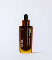 ProtoClinical k-beauty MEDIHEAL Vitamin Derma Ampoule Brightening 50ml single upright brown ampoule bottle centered on a pale background