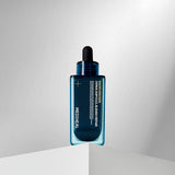 ProtoClinical k-beauty MEDIHEAL Madecassoside Derma Ampoule Blemish Repair 50ml single cool gray product package centered in a square frame on a soft light background