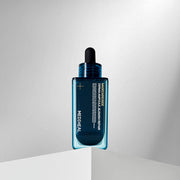 ProtoClinical k-beauty MEDIHEAL Madecassoside Derma Ampoule Blemish Repair 50ml single cool gray product package centered in a square frame on a soft light background