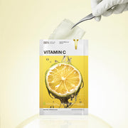 ProtoClinical k-beauty MEDIHEAL Vitamin C Essential Mask Clear Toning 24ml X 10ea single yellow mask pouch centered upright on a soft yellow background