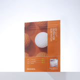 ProtoClinical k-beauty MEDIHEAL Cut Outdoor Sun Patch [Triple Protection] 4P single upright sun patch packet with a warm brown center on a pale blue and pink background
