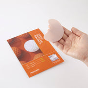 ProtoClinical k-beauty MEDIHEAL Cut Outdoor Sun Patch [Triple Protection] 4P single horizontal sun patch packet with a peach center and darker rounded left edge on a pale blue background