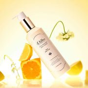 ProtoClinical k-beauty warm yellow beauty product silhouette with a darker lower center on a light background.