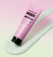 ProtoClinical k-beauty pink beauty graphic with a muted gray center and soft pale green lower accents on a light background.