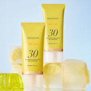 MENOKIN Glow & Clear Gel Sunscreen SPF50+ PA++++ 50ml golden sunscreen bottle on a light background