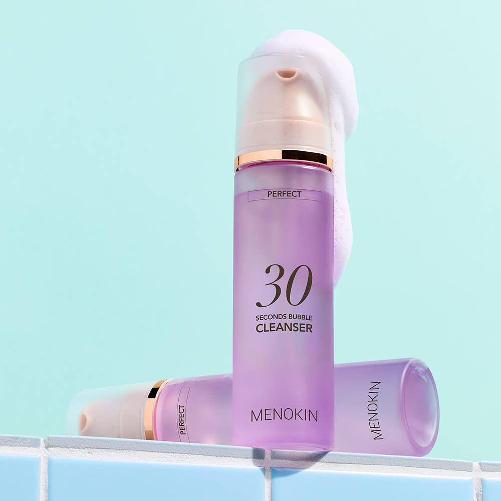 ProtoClinical k-beauty lavender beauty product packaging centered on a soft aqua background.