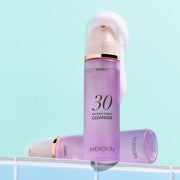ProtoClinical k-beauty lavender beauty product packaging centered on a soft aqua background.