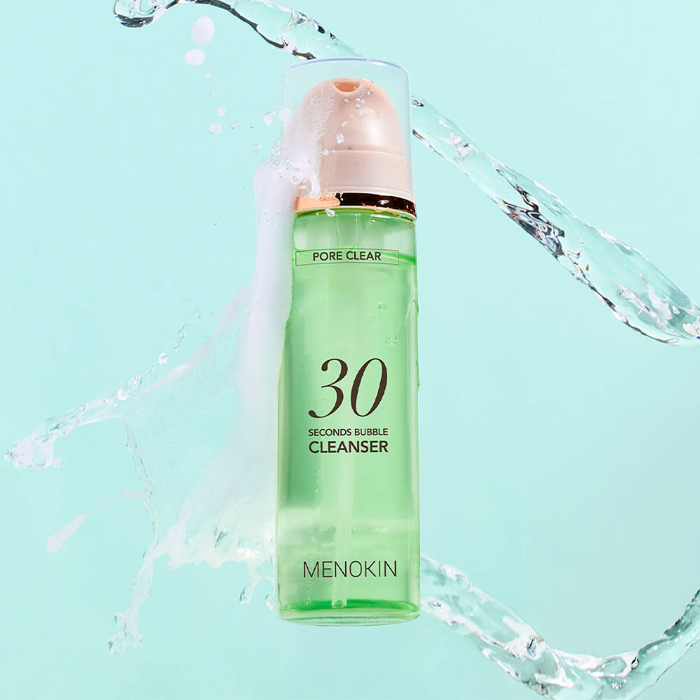ProtoClinical k-beauty green beauty product packaging centered on a pale blue background.