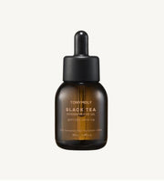 ProtoClinical k-beauty dark brown beauty product silhouette on a pale background with soft blue side accents.