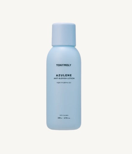 ProtoClinical k-beauty TONYMOLY Azulene Anti Blemish Lotion 200ml single upright pale blue lotion bottle centered on a soft white and peach background.