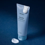 ProtoClinical k-beauty TONYMOLY Azulene Anti Blemish Acne Foam Cleanser 150ml single upright blue cleanser tube centered on a dark blue background.