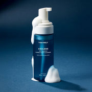 ProtoClinical k-beauty TONYMOLY Azulene Anti Blemish Bubble Foam Cleanser 150ml single upright blue cleanser tube centered on a dark blue background.