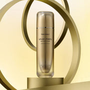 ProtoClinical k-beauty tan skincare packaging with pale cream side panels on a muted green background.