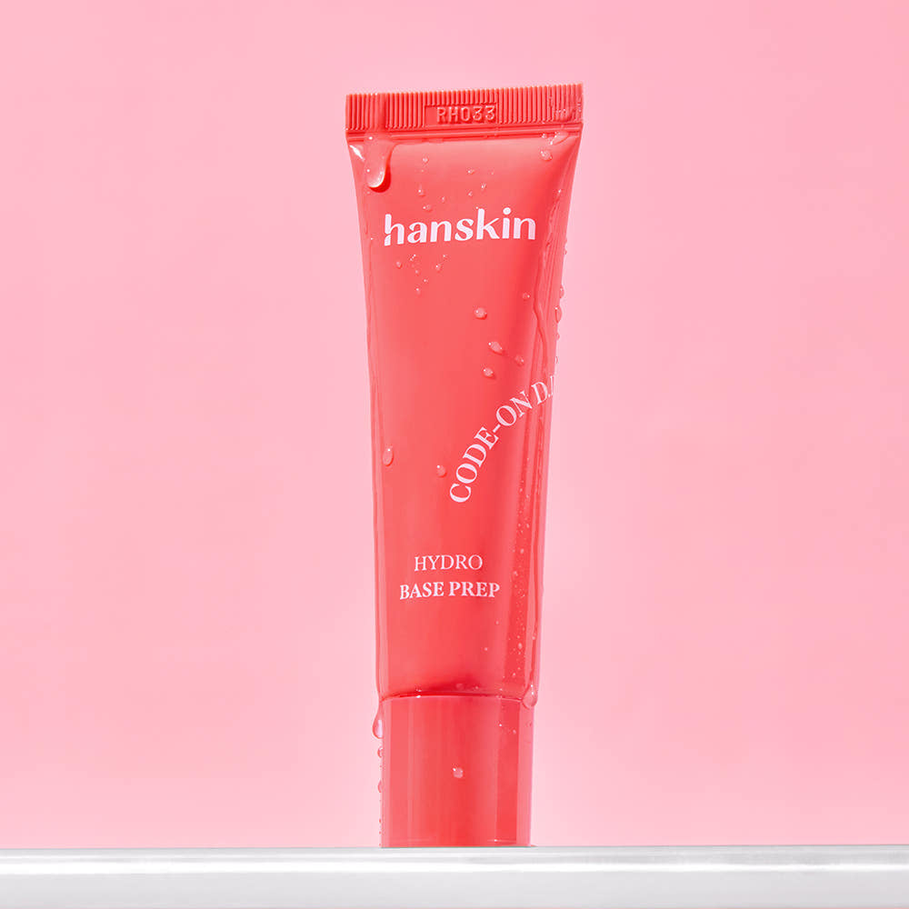 ProtoClinical k-beauty Hanskin CODE-ON DD Hydro Base Prep 30ml single upright rosy pink package centered on a pale pink background.